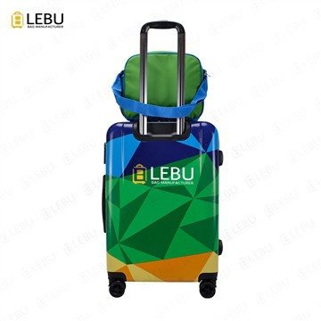 How can I remove the sticker on the suitcase?